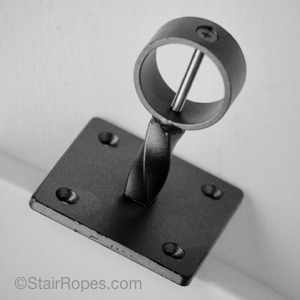 Wrought iron custom fitting with square base plate & twisted stem
