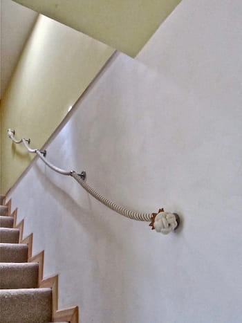 cotton wound rope installed into stone wall