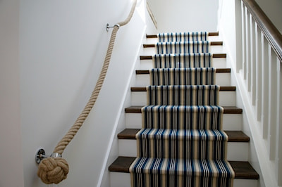 24mm hemp bannister rope with manrope knots and wrought iron fittings