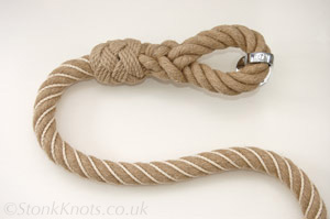 Stair rope in hemp wormed with cotton with whipped eyesplice.
