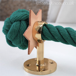 2 ply manrope knot in green p.o.s.h.with brass stair rope bracket and star washer