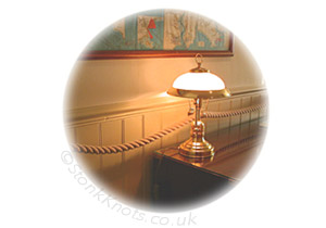 rope handrail with nautical lamp