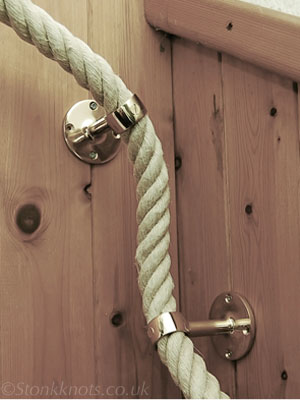 hemp bannister rope with brass fittings on corner